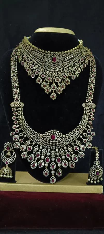 American diamond bridal jewellery set — white stone choker, haram and jhumka on a display stand