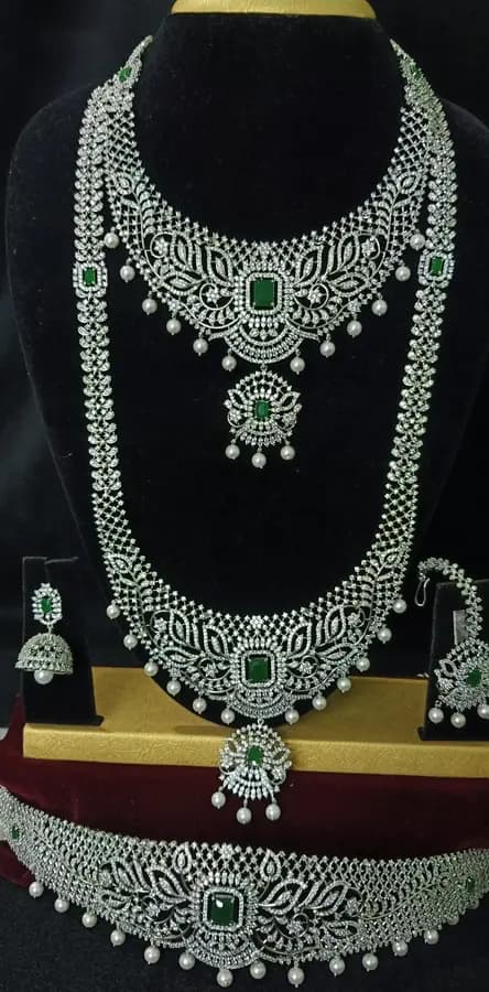 American diamond bridal jewellery set — white stone choker, haram and jhumka on a display stand