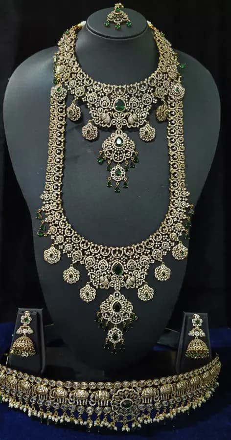 American diamond bridal jewellery set — white stone choker, haram and jhumka on a display stand